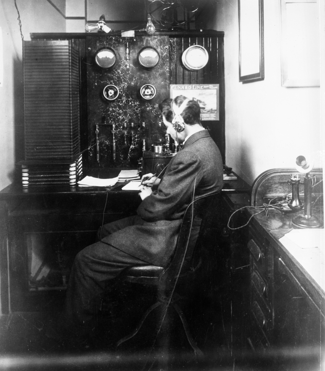 Sarnoff in 1912 working with headphones on