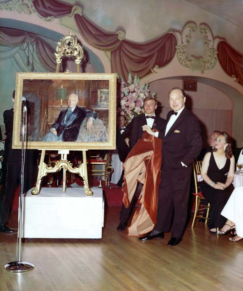 Sarnoff's son unveils a painting of his father at a party
