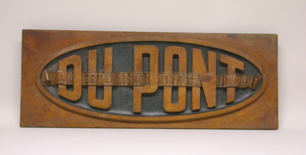 Wooden DuPont carved logo