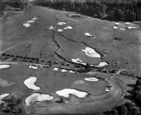 The crowd surrounding Bobby Jones and Gene Homans during their final round of the U.S. Amateur on September 27, 1930 at Merion Golf Club.