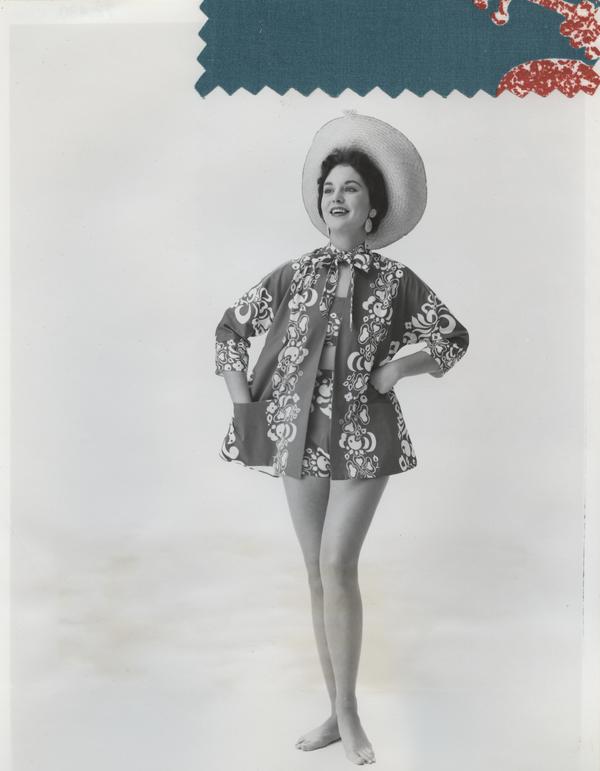 Black and white image of a woman in a beach ensemble with a teal and red color swatch attached.