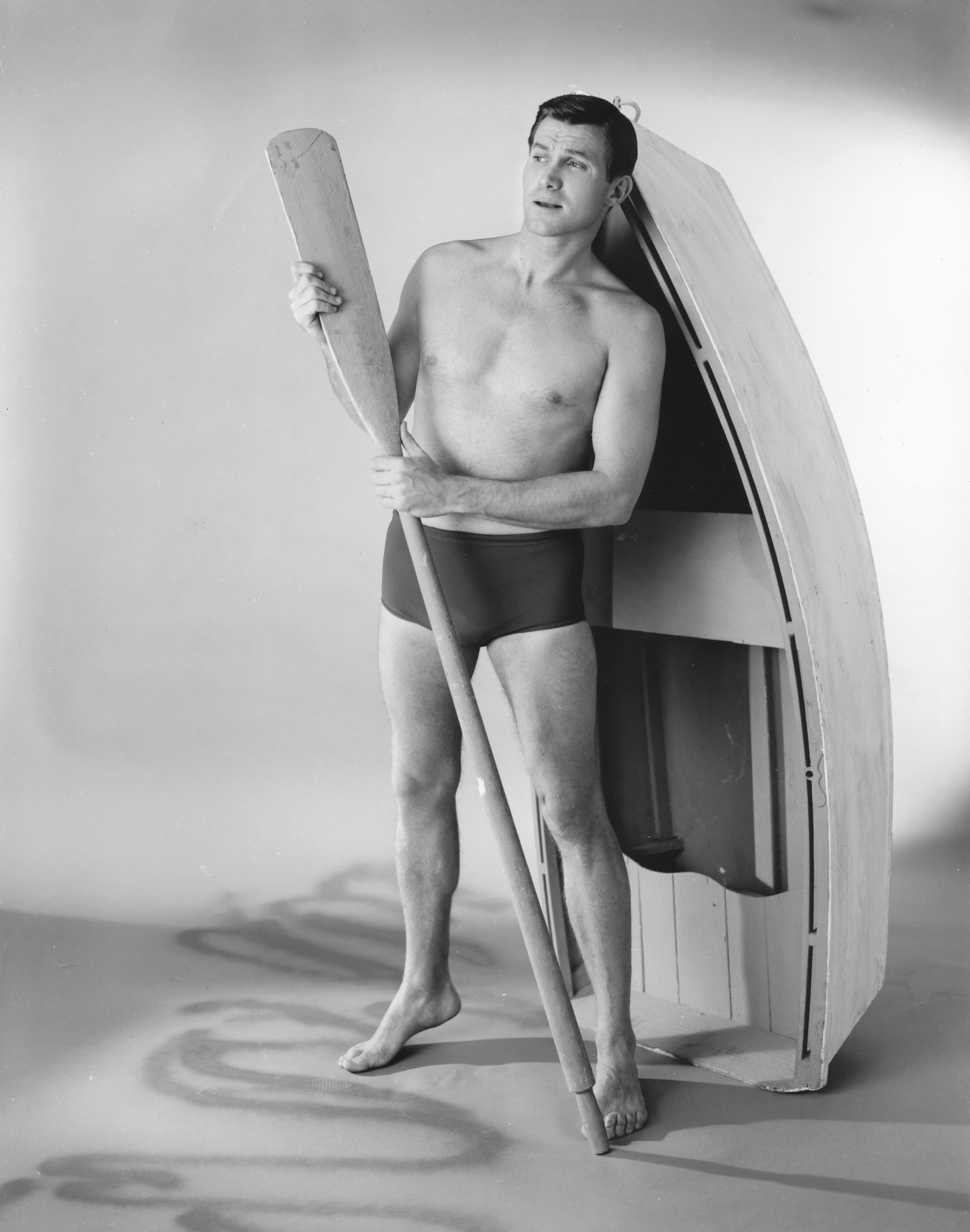 Black and white fashion photograph advertising 1960s era Ban-Lon swim trunks