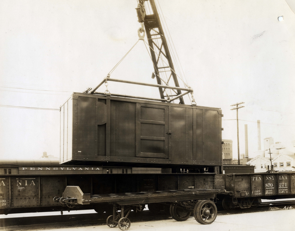 Early PRR container being placed on a railroad car, ca. 1934.
