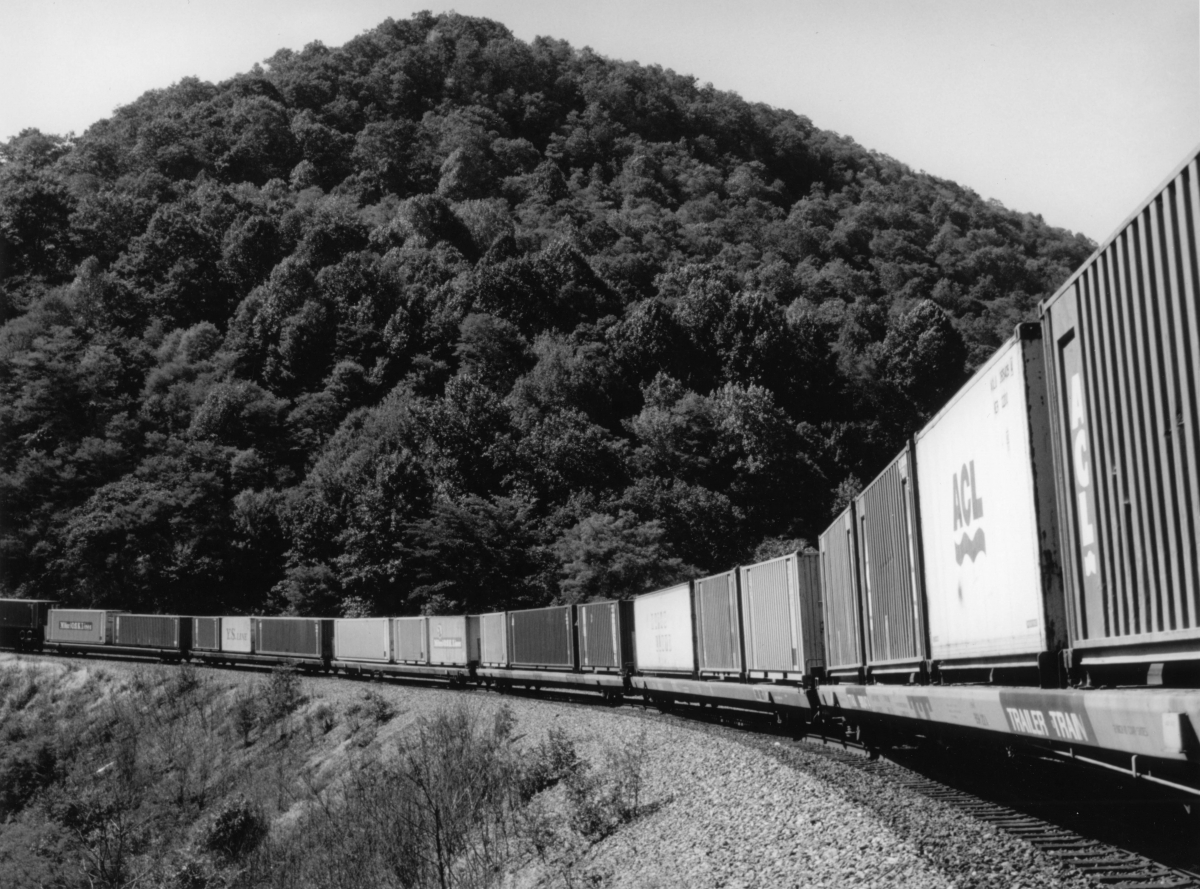 True intermodal containers, minus the truck wheels, on Trailer Train cars at Horseshoe Curve in Pennsylvania, late 1960s.