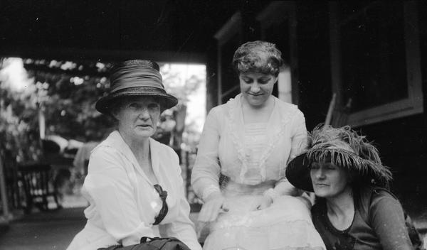 Photograph of three women on a porch, ca. 1917.