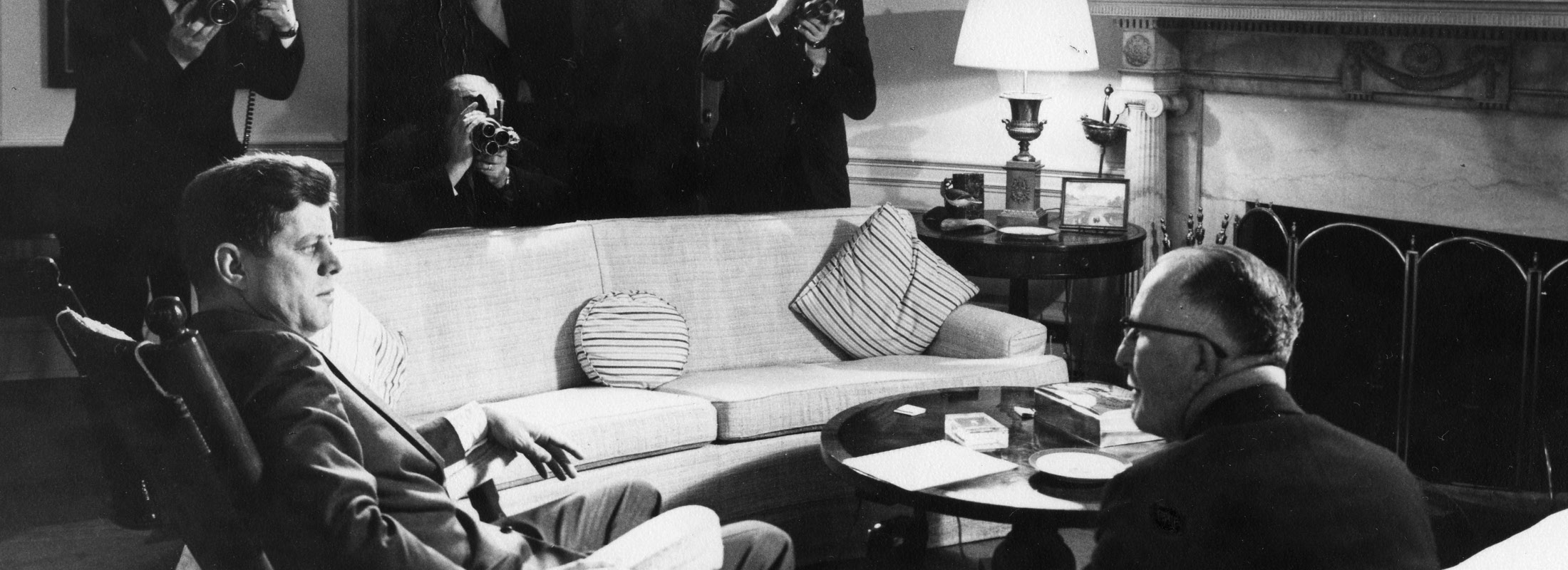 John F. Kennedy seated