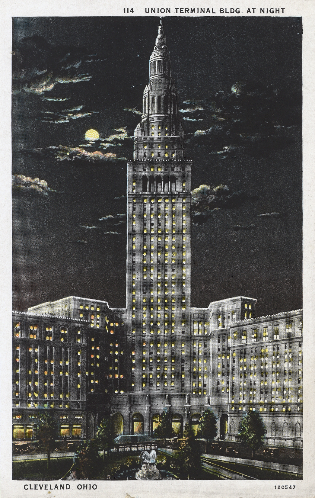 Postcard with a color illustration of the Union Railroad Terminal building at night.