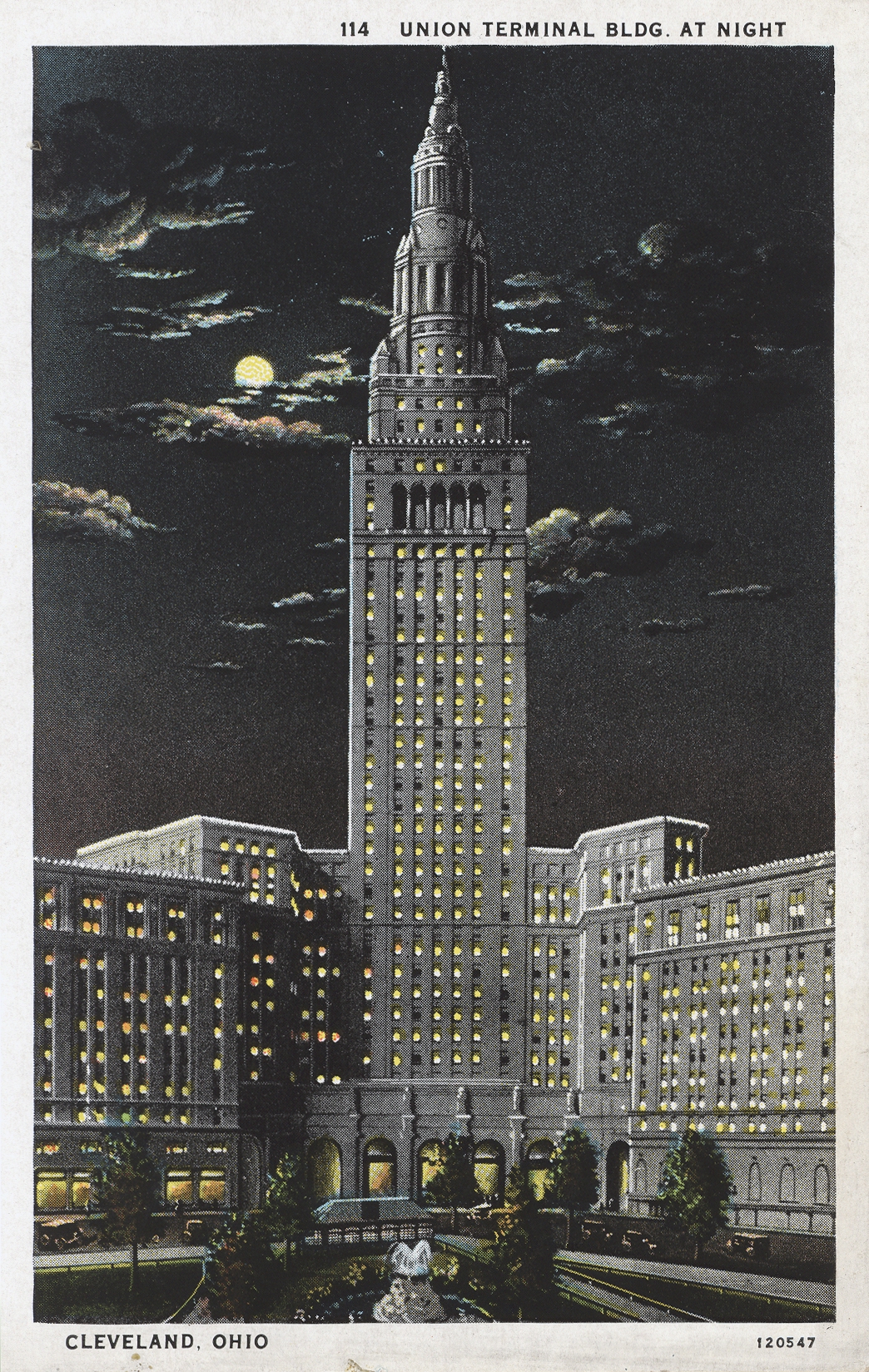 Postcard with a color illustration of the Union Railroad Terminal building at night. 