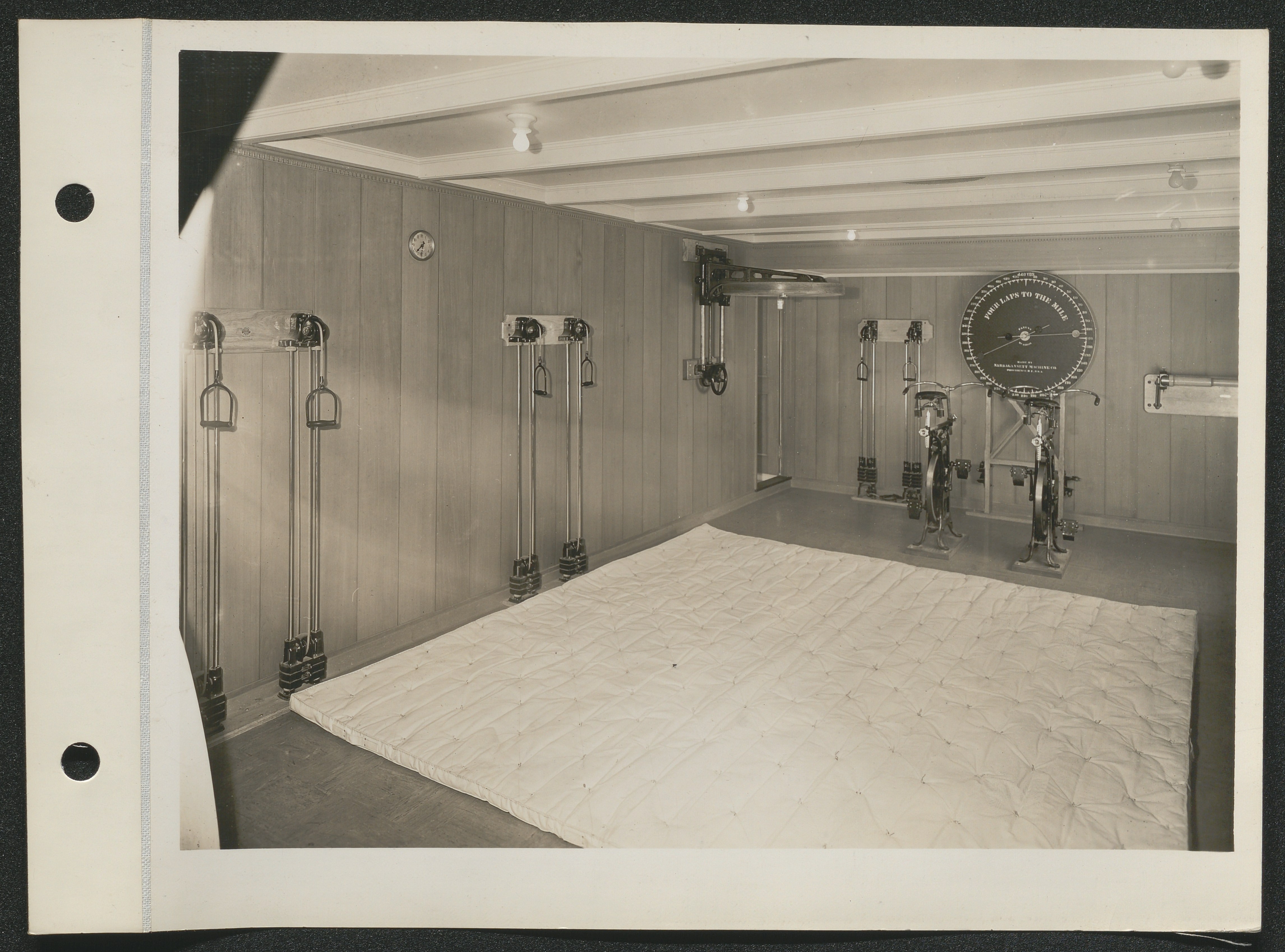 Black and white image of a fitness room with workout equipment on board the S.S. Lurline.