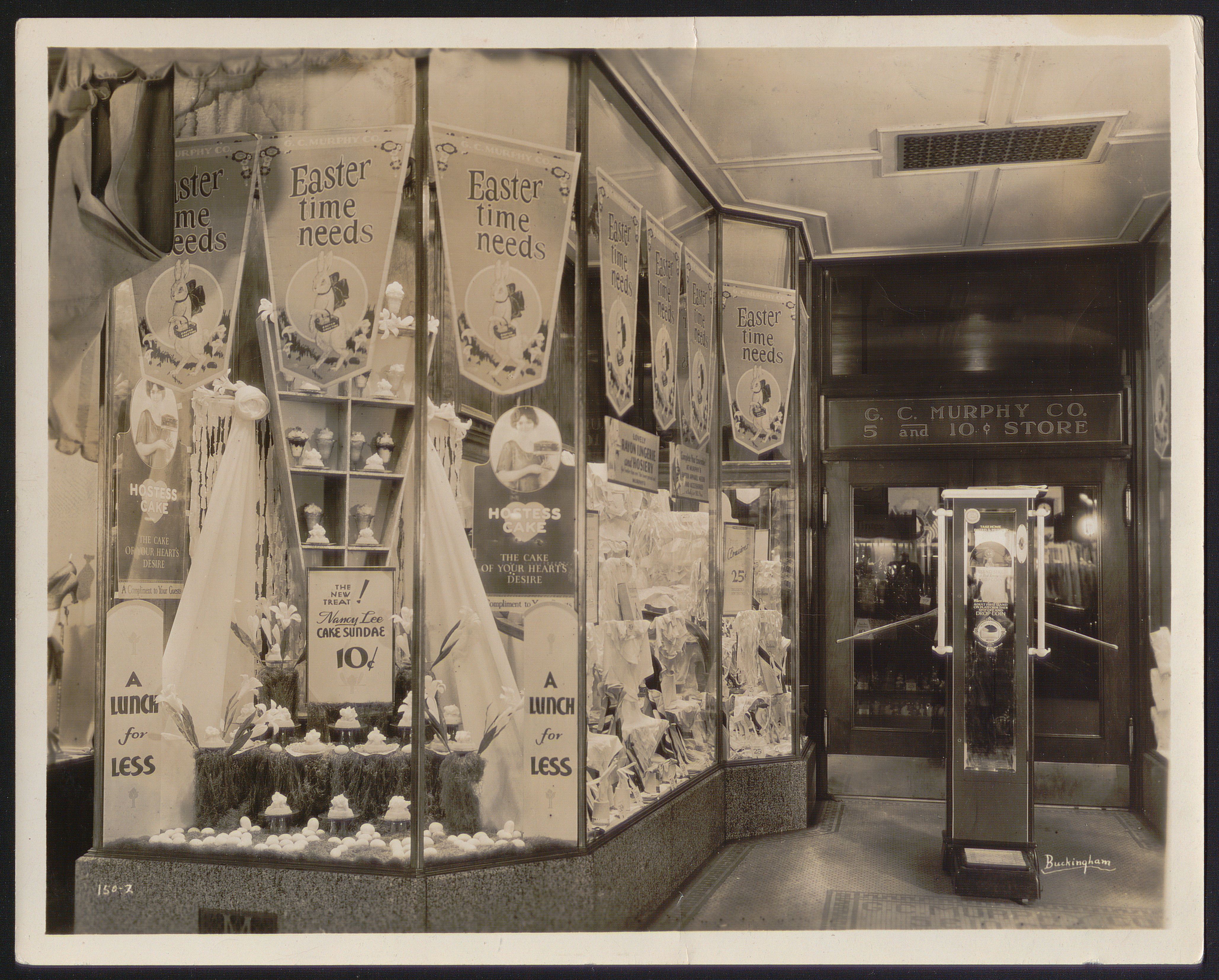 Black and white image of a 5&10 cent store window decorated for Easter.