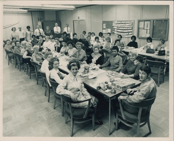 Holiday party of RCA Somerville workers, gathered around the table