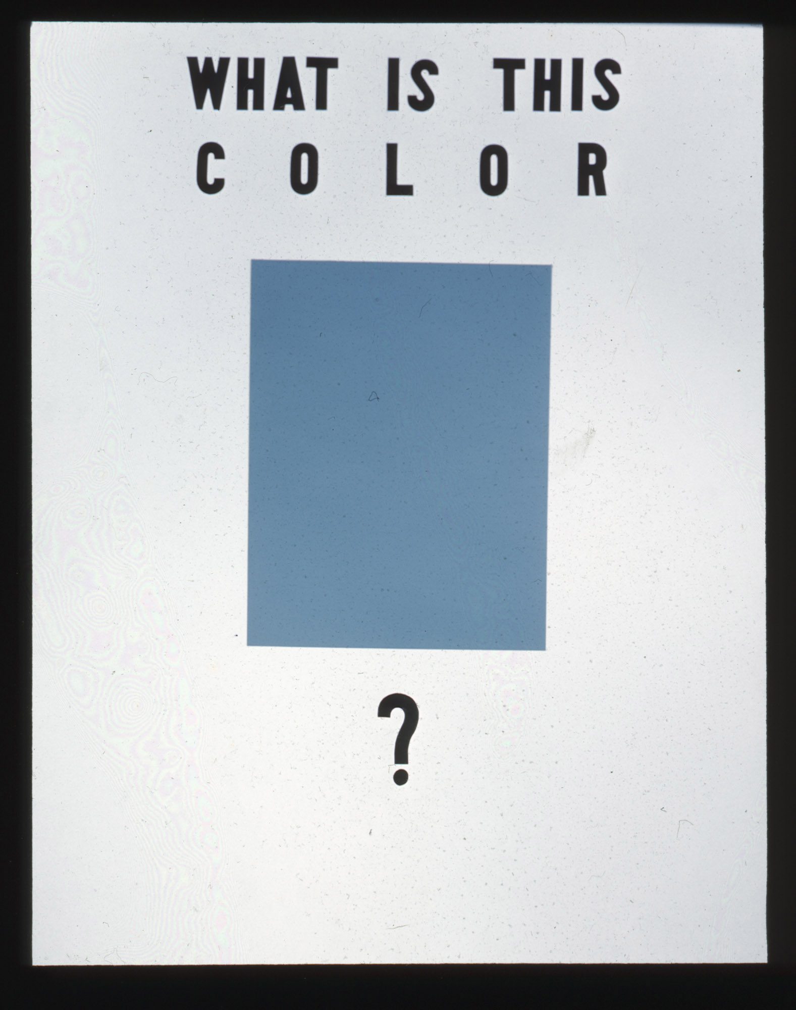 Image with a blue square and text reading "What Color Is This?"