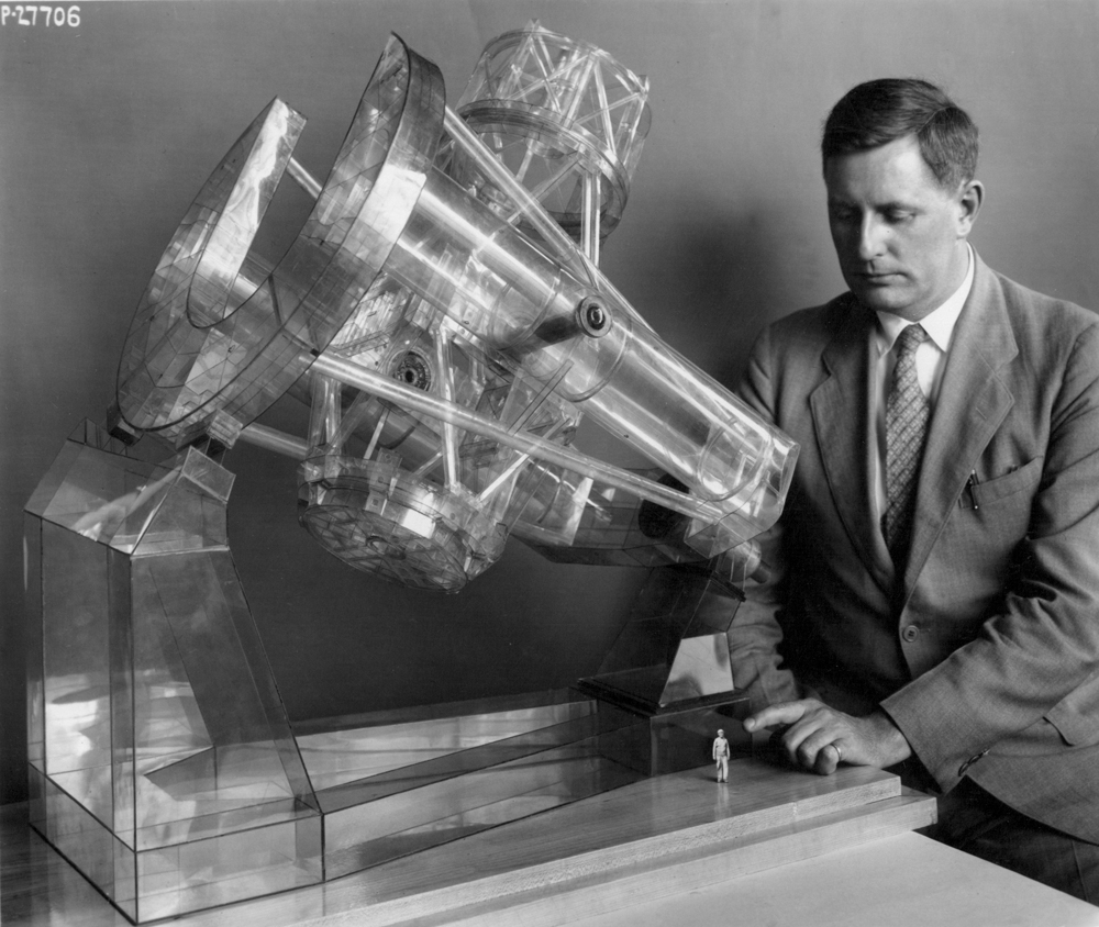 Jesse Ormondroyd with a scale model of the Hale Telescope