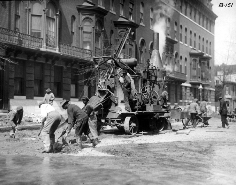 Road crew in Baltimore using Foote concrete mixer, 1915