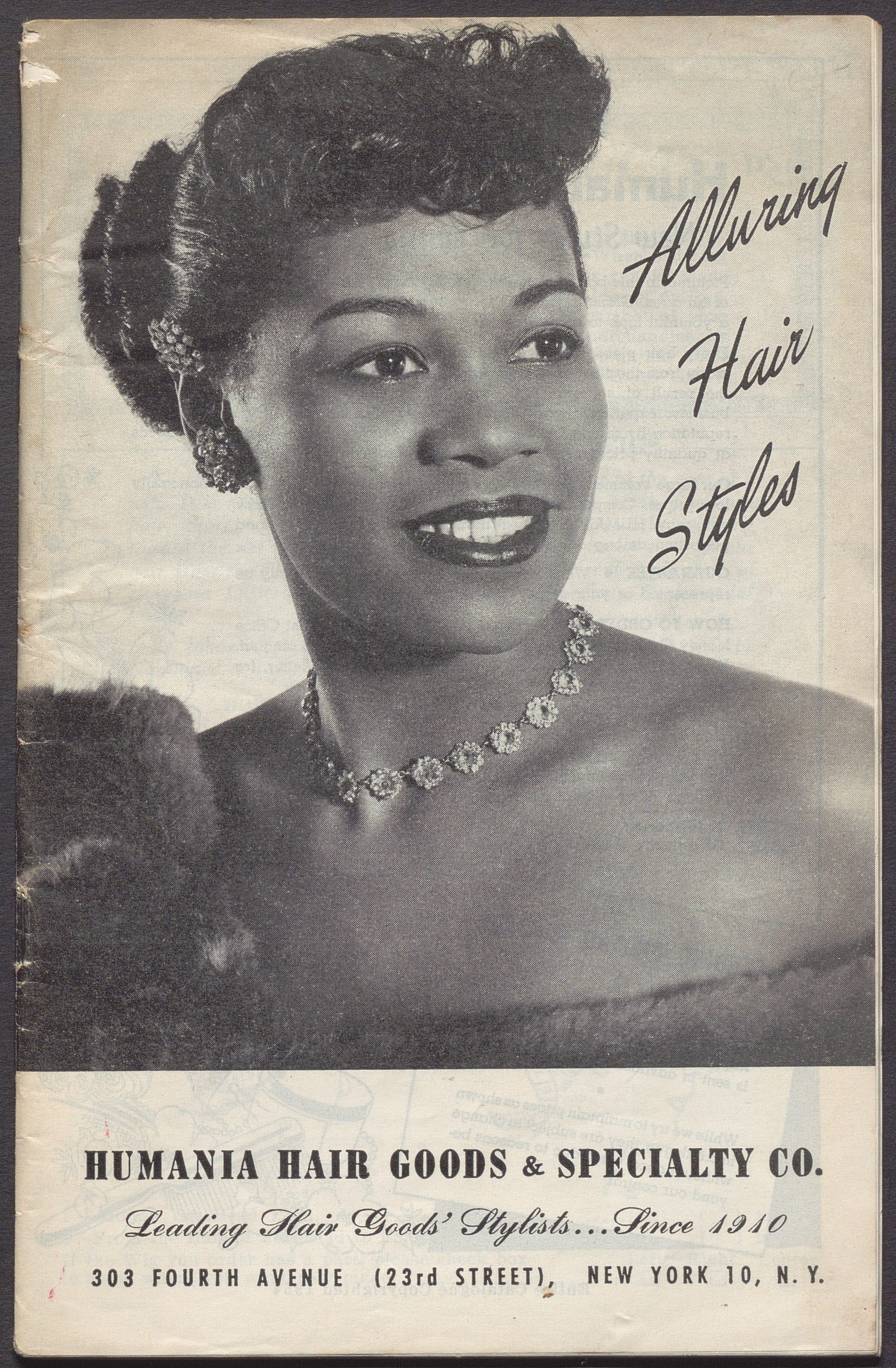 Cover of a wig catalog targeted to Black consumers, showing a photograph of a glamorous woman.
