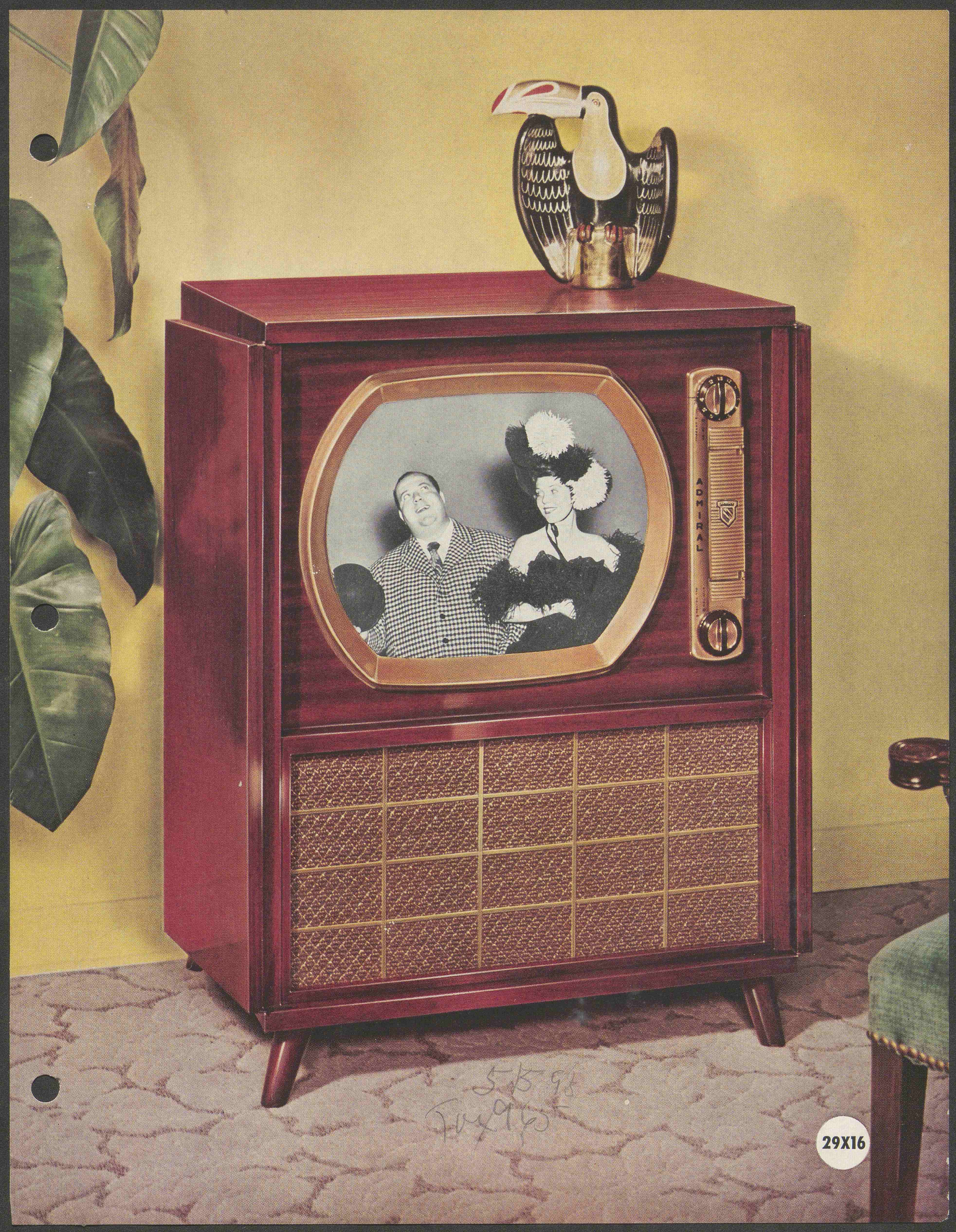 Color image of a television set in a domestic room with 1950s decor.