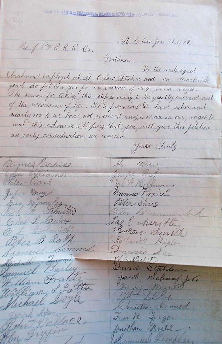 Handwritten petition on lined paper.