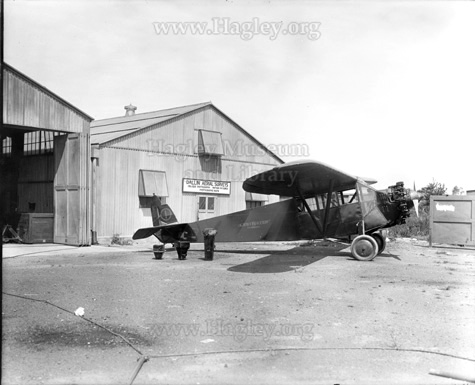 Aircraft and cameras in front of Dallin's office at the airport