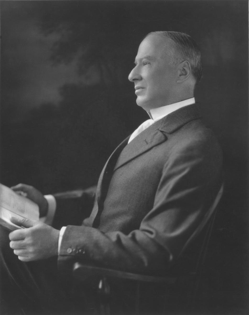 Alfred I. du Pont sitting for a photograph