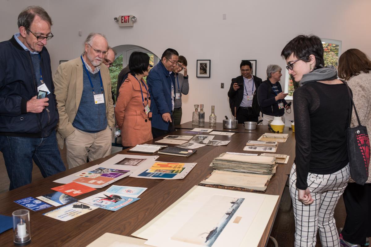 In the Soda House, the group sees a selection of items from bottles and household appliances to ads and drawings.  Photo by Jackie Kane Photography.