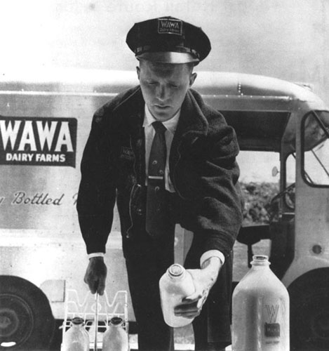 Milkman delivering milk