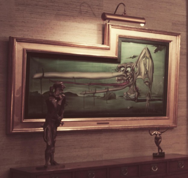 The grotesque visage and unusual framing of Theatre.