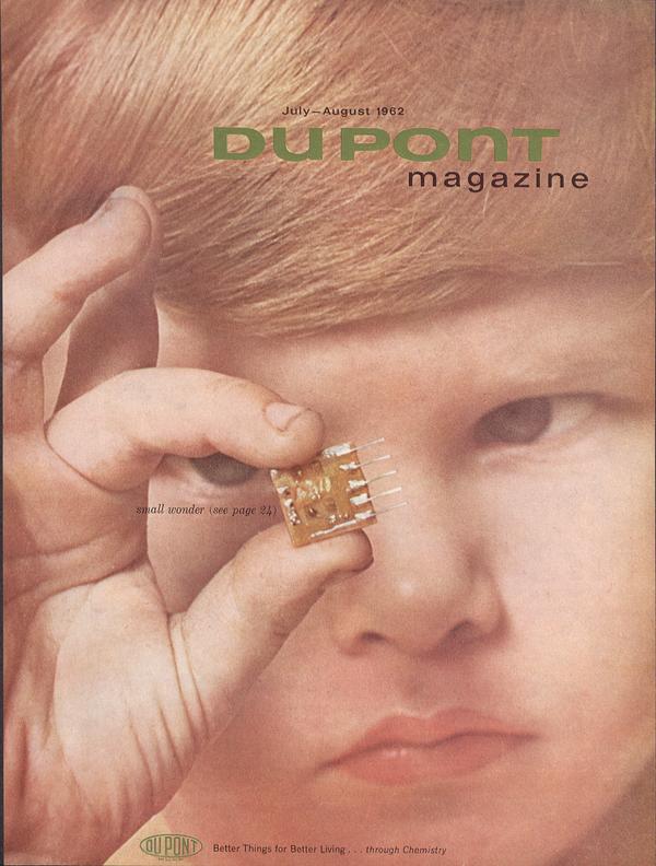 Cover of DuPont Magazine showing a close-up of a child examining a computer chip.