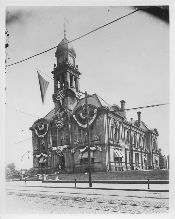 Black and white image of a courthouse decorated with bunting in honor of the Union Veterans Legion (Wilmington, Del.)