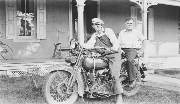 Black and white photograph of Howard Ellsworth Seal, Jr. and Lewis Welch on Harley Davidson motorcycle at Locust Knoll Farm