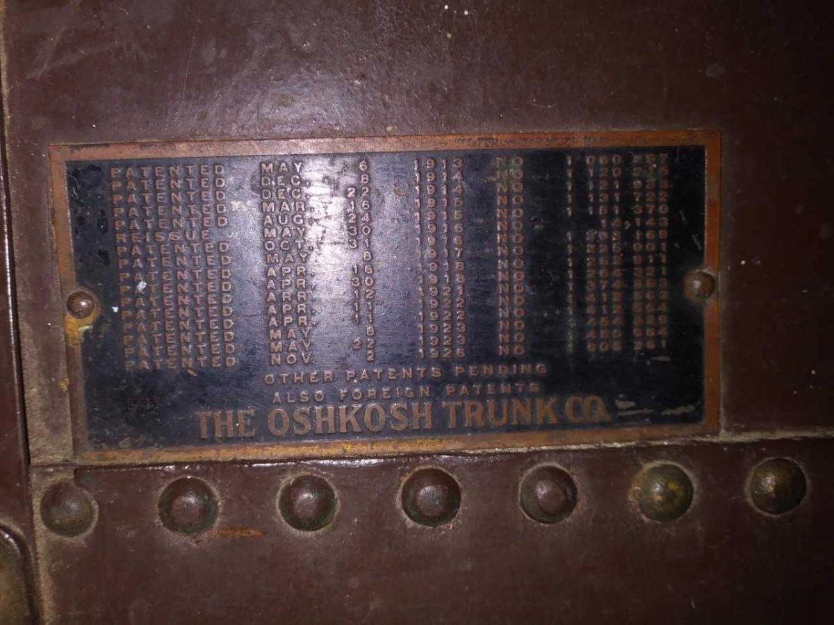 A metal plate listing the company's trunk patents.
