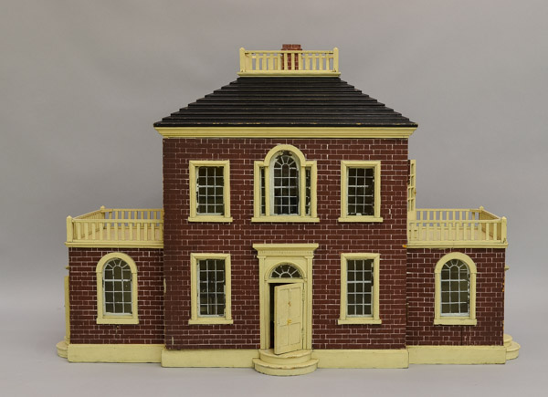 The front of the brick dollhouse