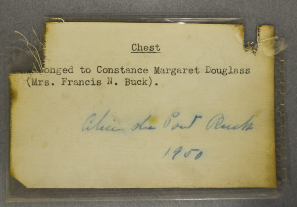 Typewritten card with info on who the chest belonged to