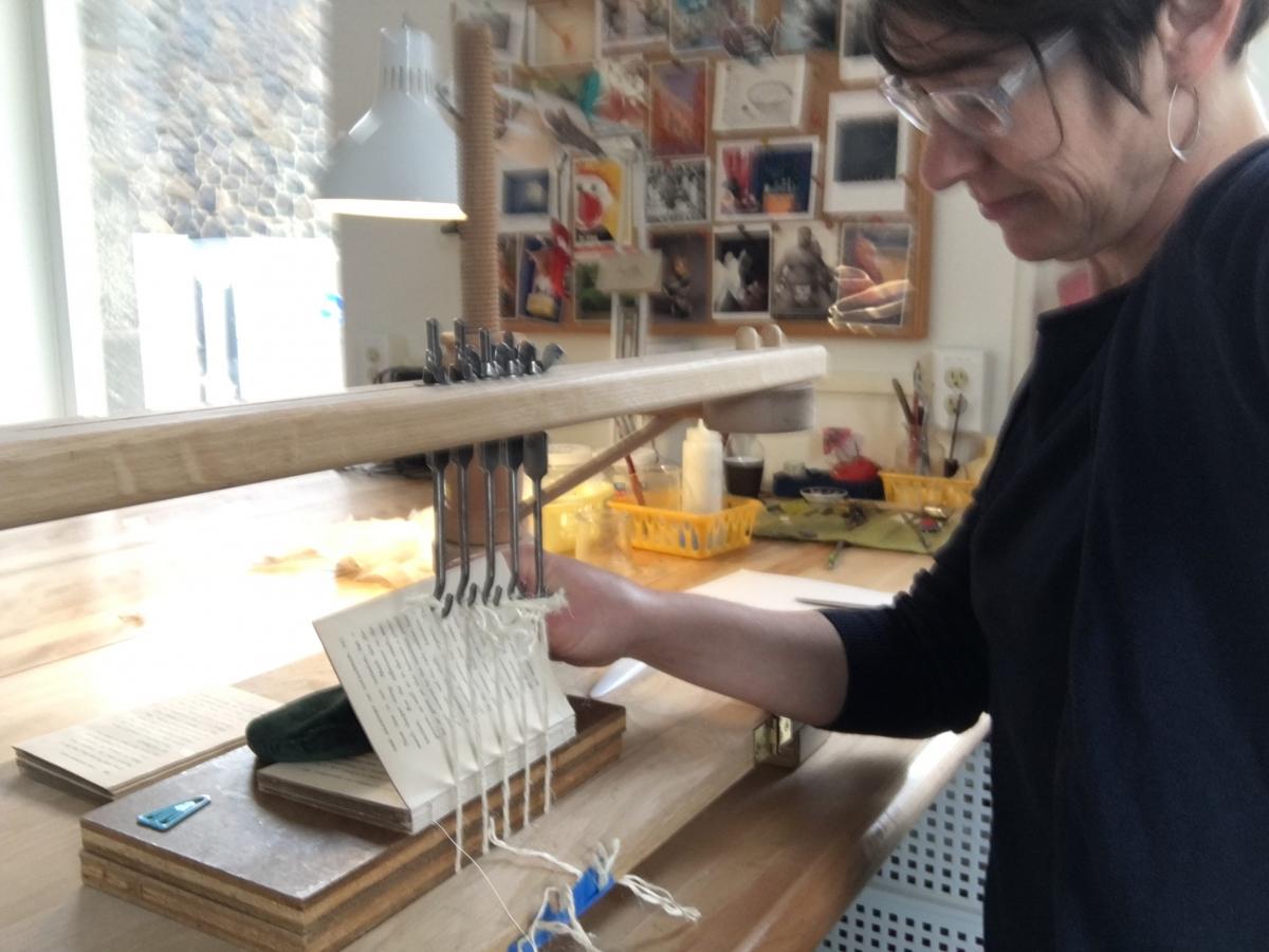 Author at sewing frame.