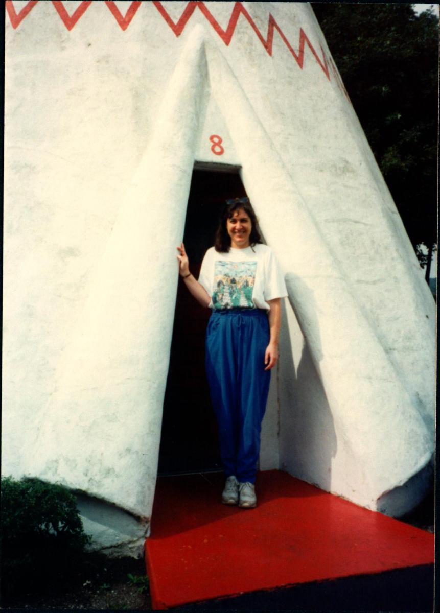 Photo. Linda Gross in Wigwam entryway