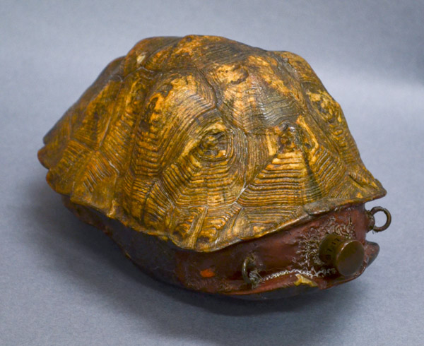 97.12.108 Gunpowder Flask – Turtle Shell Design, by an unknown American maker, 19th Century