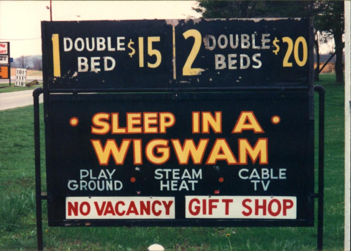 Photo. Sleep in a Wigwam Sign.