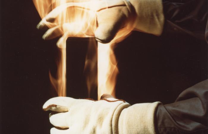 Hands Holding a burning rectangle