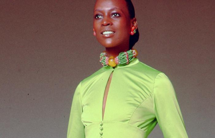 African-American woman in a green dress