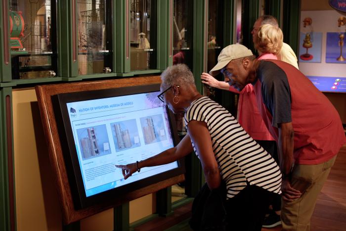 Nation of Inventors-Guests Using Touchscreen