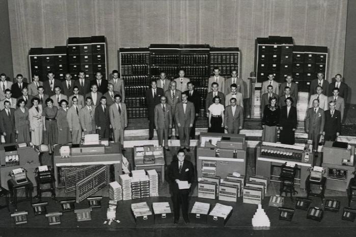 Archival image of DuPont Company accounting staff and equipment, 1950.