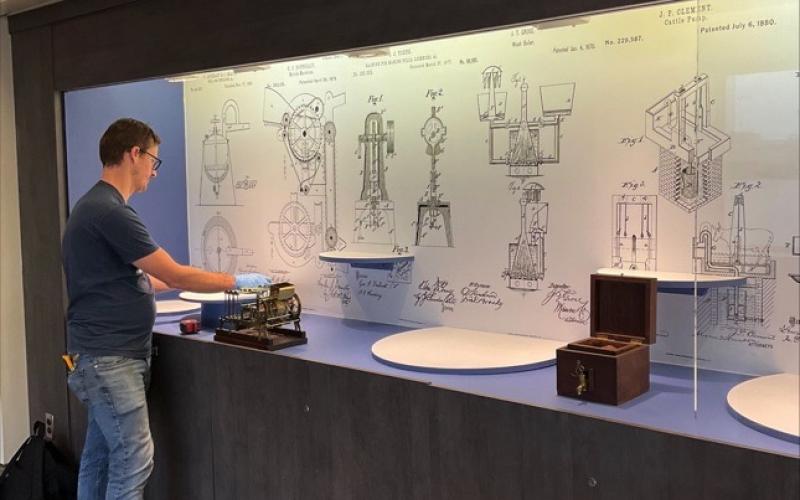Preparing to Place Patent Models in Display Case at PHL on May 16 2022-Credit Hagley Museum and Library-web860.jpg