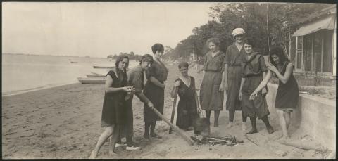 Panoramic photograph of women from DuPont Village at the community's bathing beach.