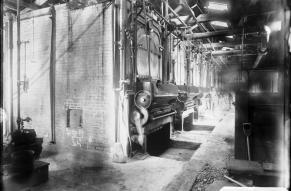 Black and white glass negative showing the  interior of a boiler house, likely at Carney's Point