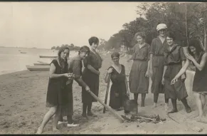 Panoramic photograph of women from DuPont Village at the community's bathing beach.