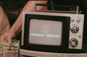 TV on a serving platter with the American Greetings logo