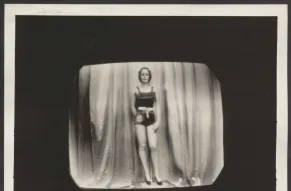 Black and white photograph of a mannequin in a woman's swim suit.