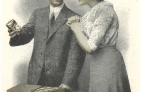 Partial color illustration of a man showing a woman a jar of peanut butter from a box of jars.