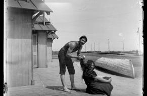 Black and white glass negative of a man and woman near the beach in Cape May.