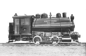 Black and white locomotive with Navy Yard - New York printed on the side.