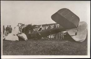 Black and white image of a crashed air mail plane
